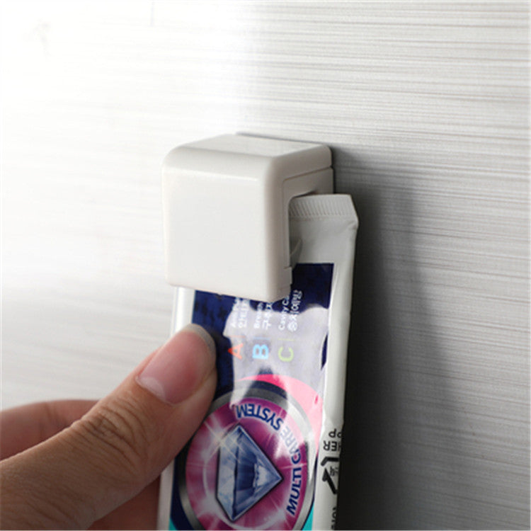 No.1336 Bathroom Multi-use Magic Toothpaste Hanger Seamless Adhesive Sticker Facial Cleanser Storage Hanging Clip Toothpaste Storage Rack Towel Hanging Clip